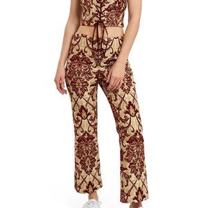 callipygian pants red brocade